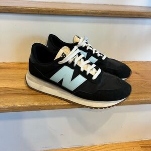 New Balance Women’s Black and Light Blue Sneakers